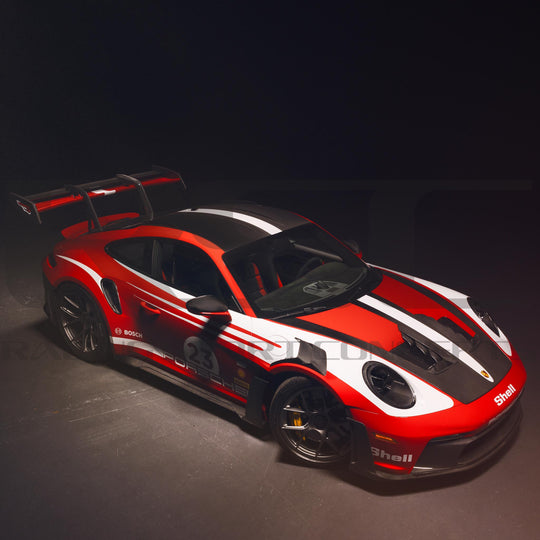 Porsche 992 GT3 RS Carbon Fiber Side Skirts by RSC Red and black race car with Shell branding on a dark background