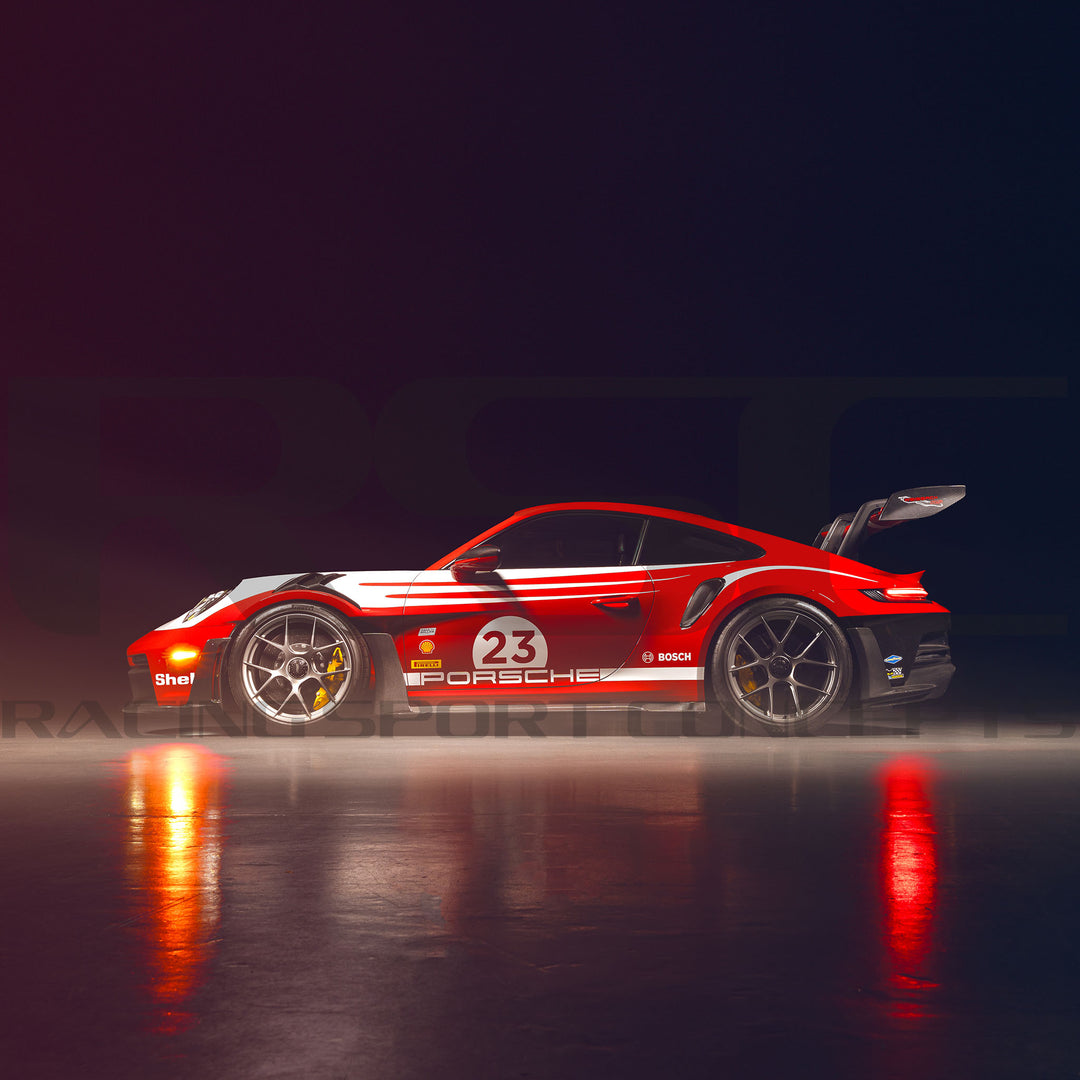 Porsche 992 GT3 RS Carbon Fiber Side Skirts by RSC side view Red Porsche race car with number 23 on a dark background