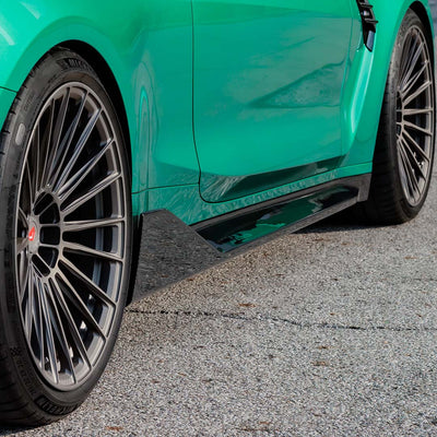 Close up rear view shot of RSC M Performance Style Side skirts for G82 M4