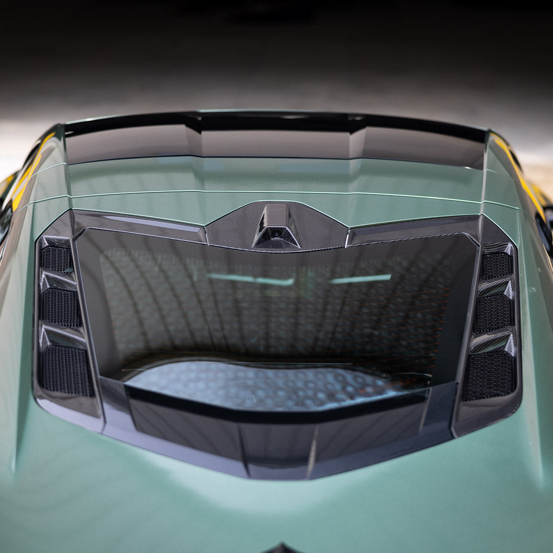 Rear view shot of the carbon fiber rear view camera cover in Carbon Fiber for C8 Corvette by RSC