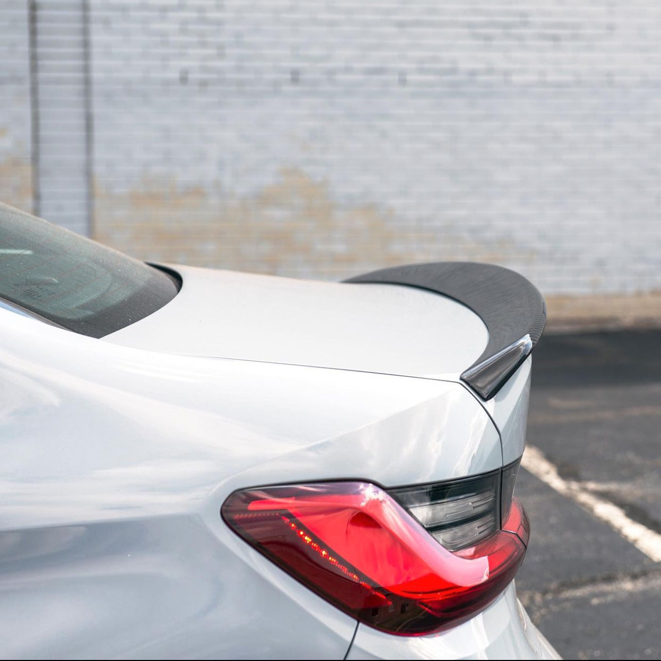 Side shot of BMW G80 M3 RSC Carbon Fiber Rear Spoiler 