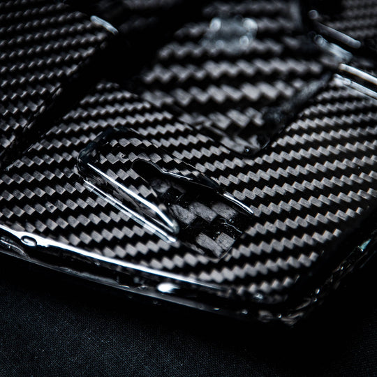 Corvette C8 Carbon Fiber Rear Camera Cover details. Showing the precise details of the CNC&