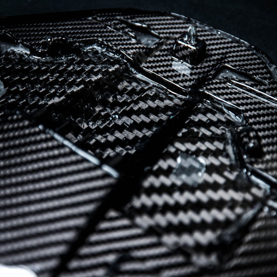 Corvette C8 Carbon Fiber Rear Camera Cover details. Showing the precise details of the CNC&