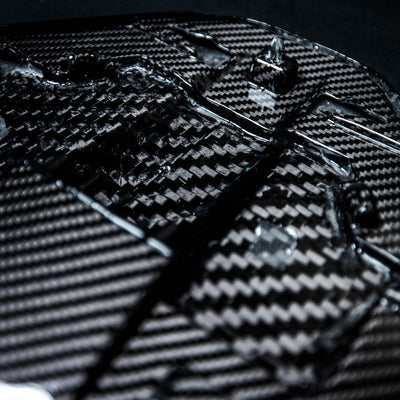 Corvette C8 Carbon Fiber Rear Camera Cover details. Showing the precise details of the CNC'd piece